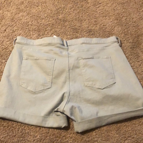 Light blue denim shorts. - Picture 2 of 2